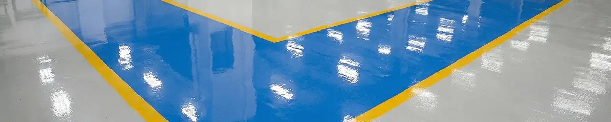 A factory floor professionally covered and marked with epoxy flooring in Minneapolis, MN