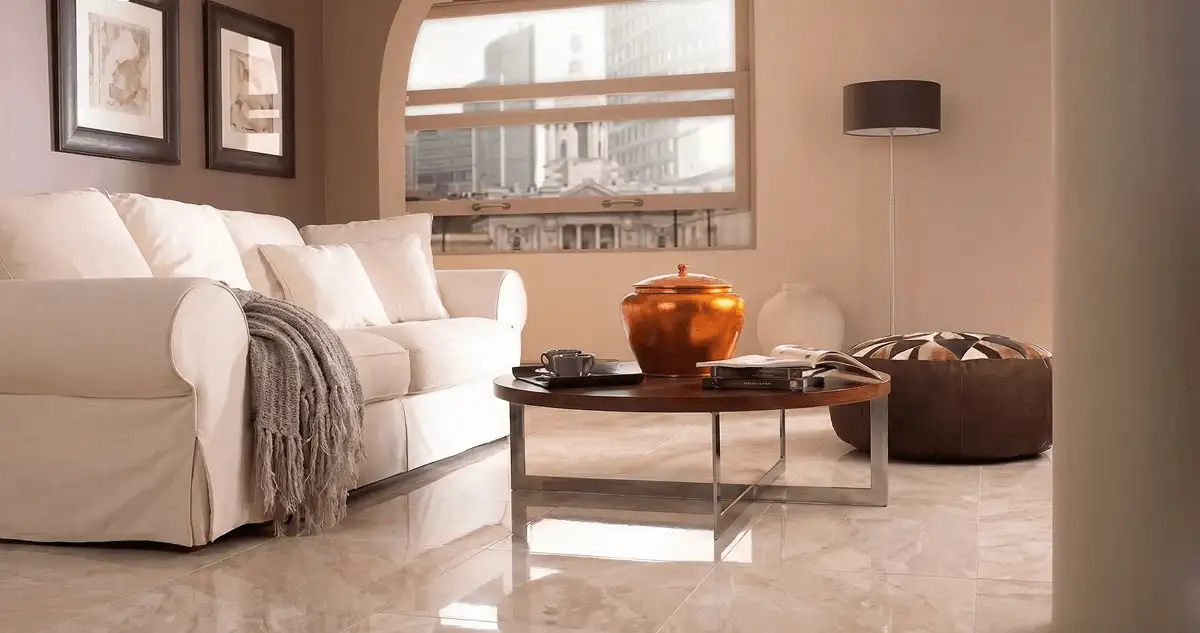 Modern living room with professionally installed marble flooring, a beige sofa, coffee table in Minneapolis, MN