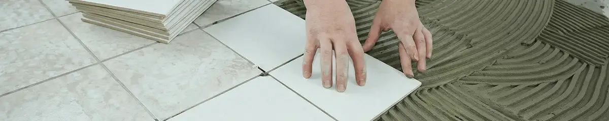 Professional installing white tile floors in Minneapolis, MN