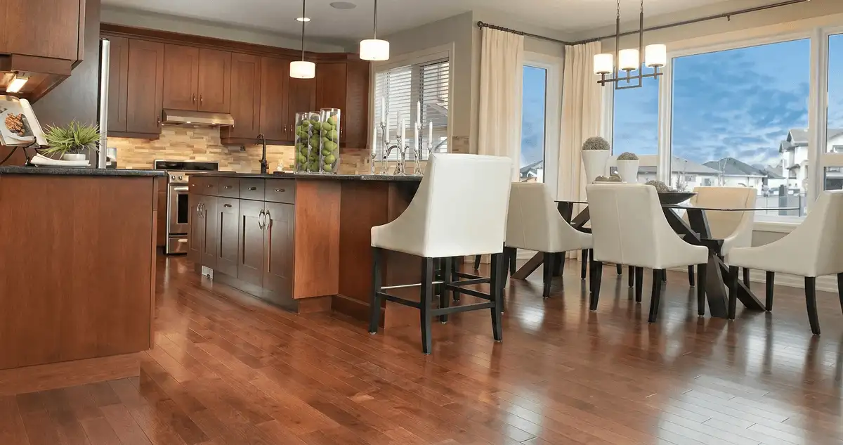 A modern kitchen with professionally installed wood flooring in Minneapolis, MN